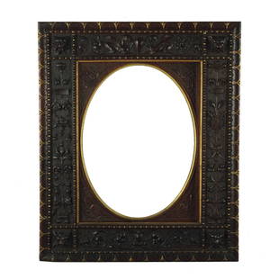 Luigi Frullini: A carved wood frame, signed: Luigi Frullini Firenze, front sight 22by16cm.; rabbet size 23,5by18cm.; total size 33,8by28cm.Frullini's artistic production was abundant, but there are few traceable