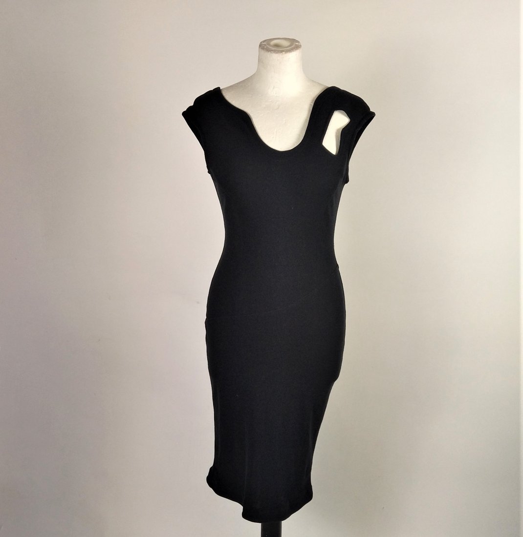 Thierry Mugler: a black cotton jersey dress with a v-neck on the front and back.90's, size 42