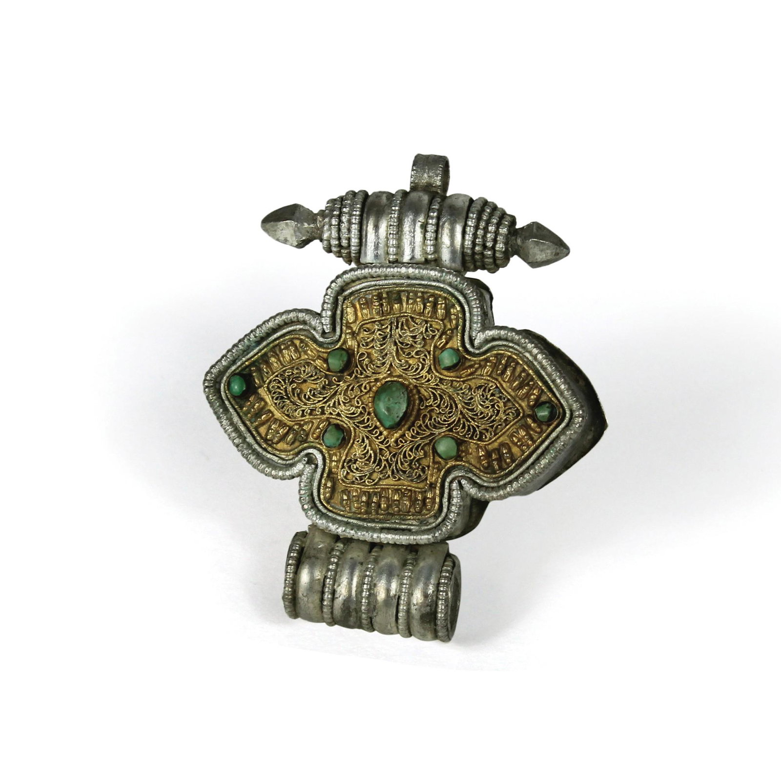 Antique silver and gilt metal gau, Tibet: in the form of a four-leaf clover enriched with filigree and turquoise applications, cm. 6x7