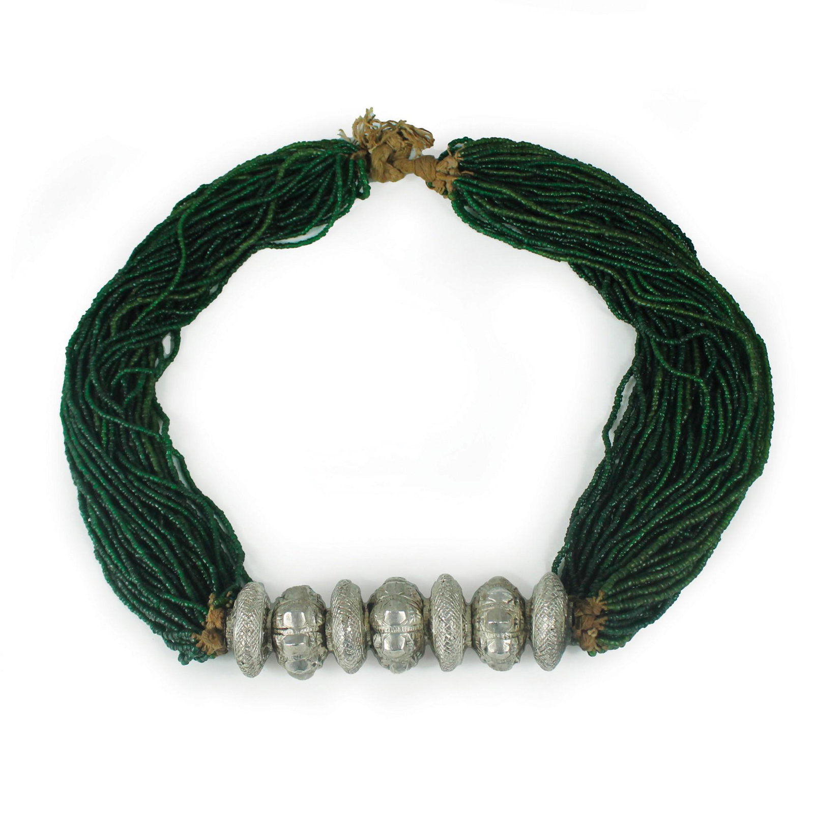 Antique tilhari necklace, Nepal: composed of 44 threads of green beads and 7 embossed silver disc elements