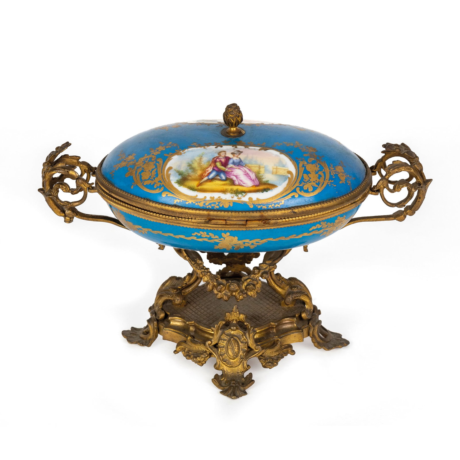 Turquoise porcelain casket, France, Napoleon III period: ovoid body painted with gilding and oval reserves with gallant scenes; golden metal frame, cm. 20x25x14 (one desoldered handle)