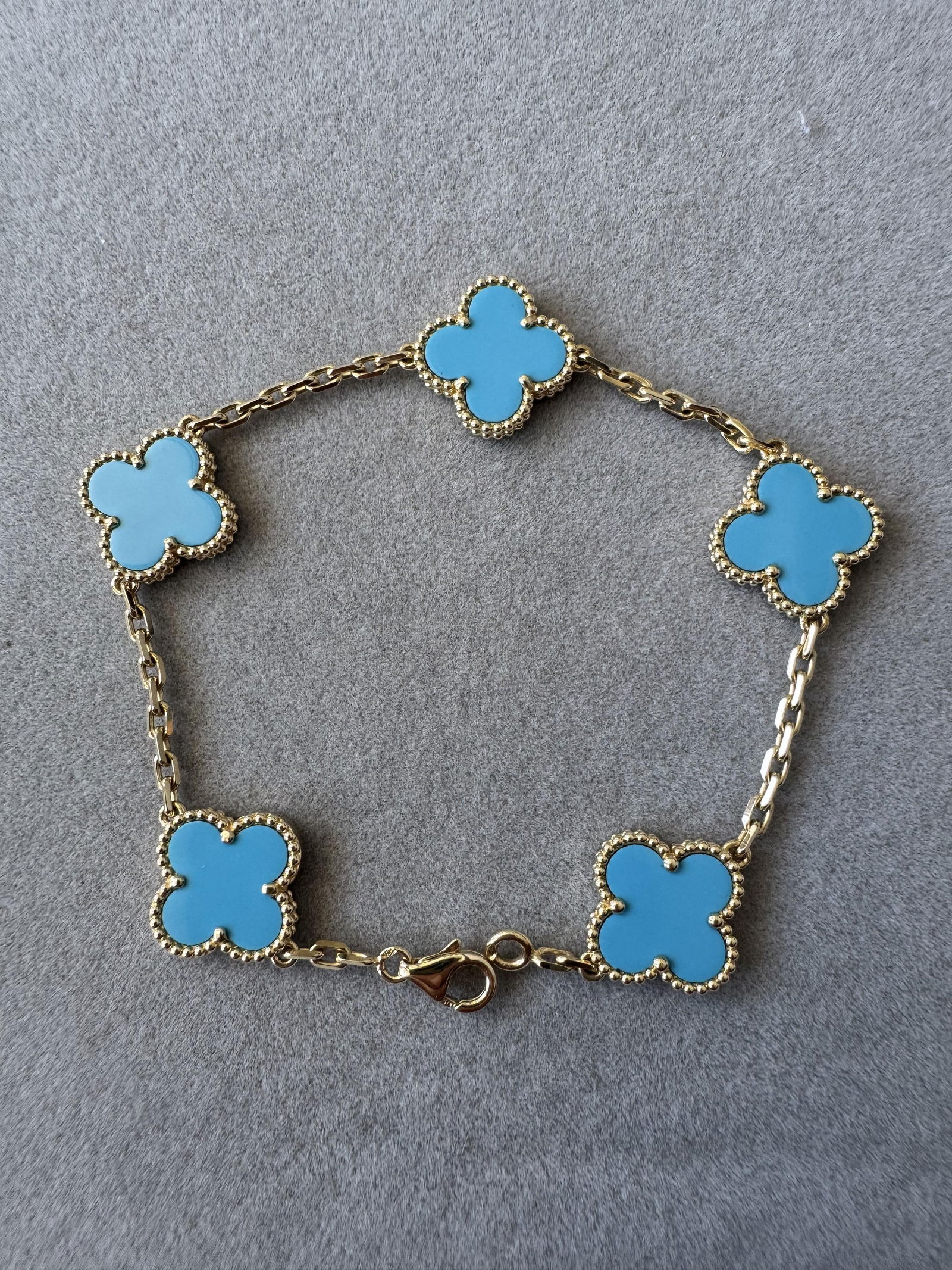 Van Cleef & Arpels Vintage Alhambra 5 Motif Blue Teal Turquoise 18K Yellow Gold Bracelet: Year: Crafted in the 2010s in FranceDimensions: Length: 7.4 inchesCondition:Very good condition with minor surface scratchesNo damage to the turquoise stoneSigns of polishing and restorationProvenance
