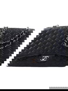 Chanel Black Leather Casual Handbag: Title/Medium: Chanel Black Leather Casual Handbag Material: Leather Color: Black Condition: Excellent Additional Info: Includes dust cover Description: Timeless and sophisticated design