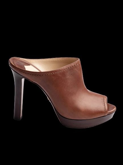 Prada Orange Leather High Heel Mules Size 37: Title: Prada Orange Leather Peep-Toe High Heel Mules Medium: Leather Origin/Year: N/A Dimensions: Heel Height: Approximately 4.5 inches Platform Height: Approximately 1 inch Size: 37 (US Wom
