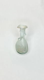 Ancient Roman Glass Bottle, 4th Century BC: Title/Medium: Ancient Roman Glass Bottle Origin/Year: Rome, 4th Century BC Dimensions: Height 10.8 cm Condition: Good, with patina Provenance: Ancient Roman origin Additional Info: Hand-