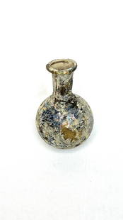 Ancient Roman Glass Globular Bottle: Title: Ancient Roman Glass Globular Bottle Medium: Glass Origin/Year: Roman, 6th-7th century BCE Dimensions: Height: 7.5 cm Condition: Strong silver patina, aged surface Provenance: Ancient Rom