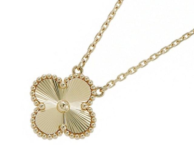 Van Cleef & Arpels Vintage Alhambra 18K Yellow Gold Guilloche Pendant Necklace: Title/Medium: Van Cleef & Arpels Vintage Alhambra Guilloche Pendant Necklace Origin/Year: France/20th Century Dimensions: Standard length for pendant necklaces Condition: Very good pre-owned condition