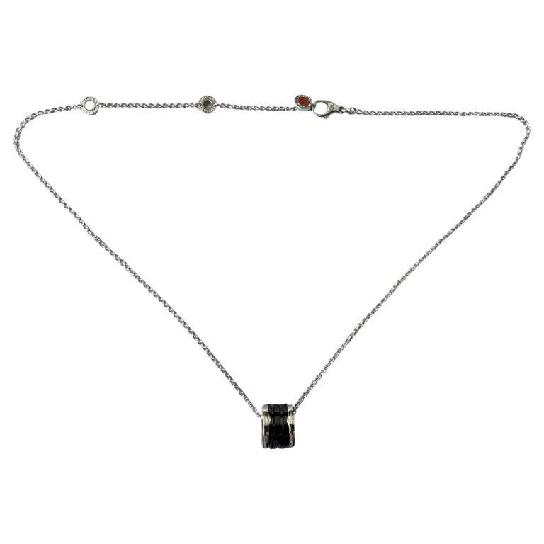 Bvlgari Save the Children Silver Necklace: Title: Bvlgari Save the Children Silver Necklace Medium: Sterling Silver and Black Ceramic Origin/Year: Italy, Contemporary Dimensions: Length of chain: 20 inches, Pendant diameter: 1.5 inches Conditi