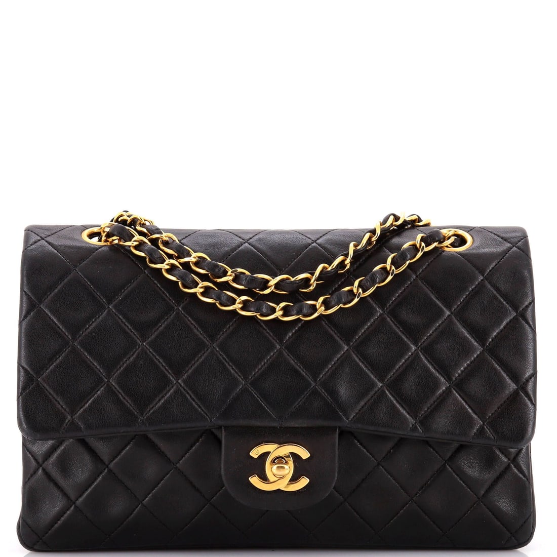 Chanel Vintage Classic Flap Bag - Black Leather: Title/Medium: Chanel Medium Vintage Classic Double Flap Bag Origin/Year: France, Vintage Dimensions: Handle Drop: 9 inches Height: 6 inches Width: 10 inches Depth: 2.5 inches Strap Dro
