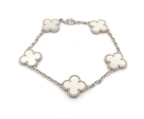 Van Cleef & Arpels Vintage Alhambra White Mother of Pearl 18K White Gold Bracelet: Title/Medium: Van Cleef & Arpels Vintage Alhambra 5-Motif Bracelet Origin/Year: France Dimensions: Approx. 7.4 inches in length Condition: Excellent pre-owned condition with minimal wear Provenance: O