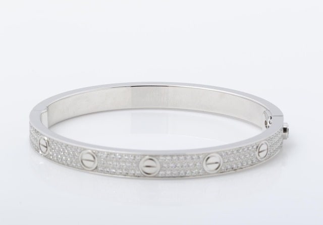 Cartier Love Diamond Pave Thick Model Paved 18K White Gold Bracelet Bangle (Rare): Title/Medium: Cartier Love Diamond Pave Thick Bracelet in 18K White Gold Origin/Year: France, 2010-2019 Dimensions: Thick/wide design Condition: Very good pre-owned condition. Please review all photos