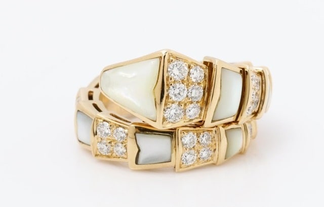 Bulgari Bvlgari Serpenti Diamond & White Mother of Pearl Viper 18K Rose Gold Ring: Title: Bulgari Bvlgari Serpenti Diamond & White Mother of Pearl Viper 18K Rose Gold Ring A stunning creation from Bvlgari's Serpenti Viper Collection, this elegant ring is crafted in 18K rose gold and