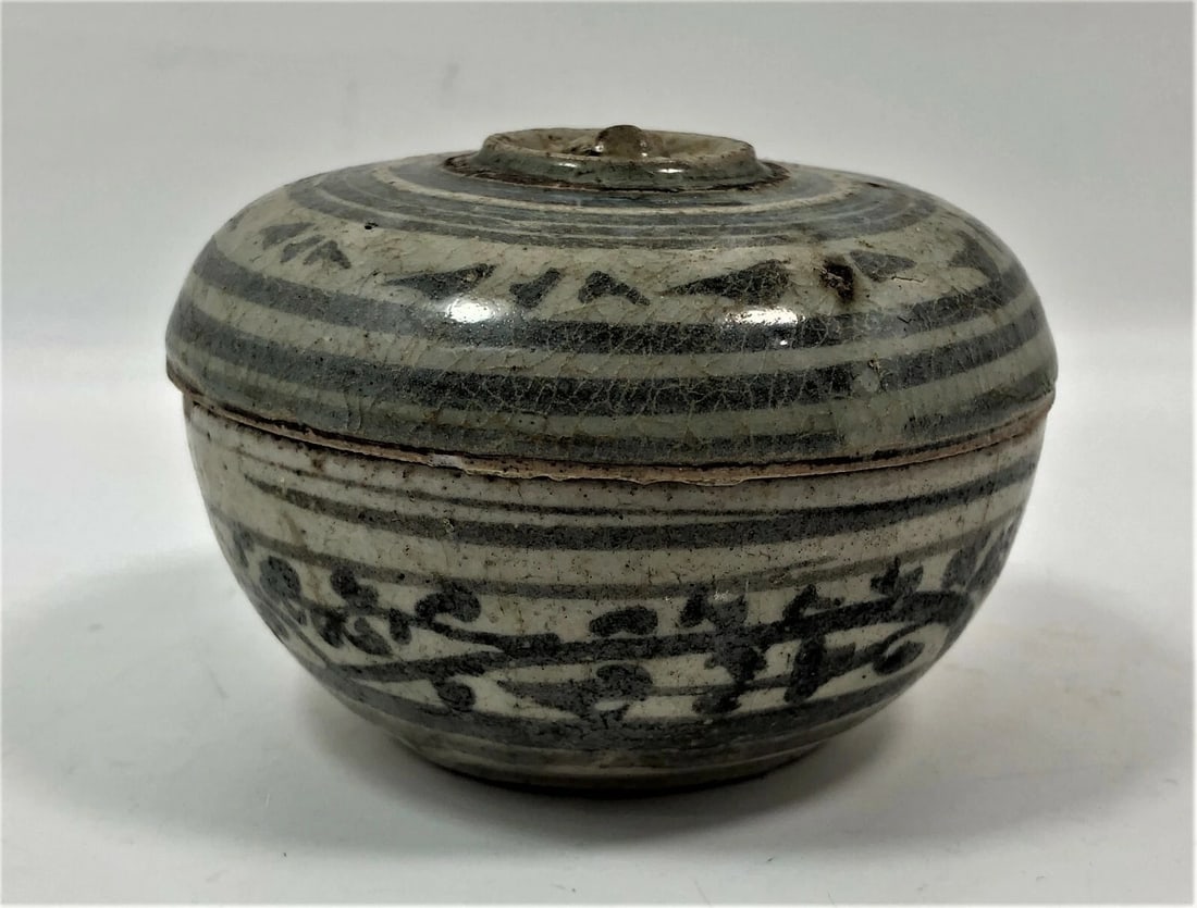 Thai Sawankhalok Covered Jar, 14th Century: Title: Miniature, Cabinet Sized Green White Thai Sawankhalok Covered Jar Origin/Year: Thailand, 14th Century Dimensions: Approximately 10 cm in height Condition: Good, with age-related crackling