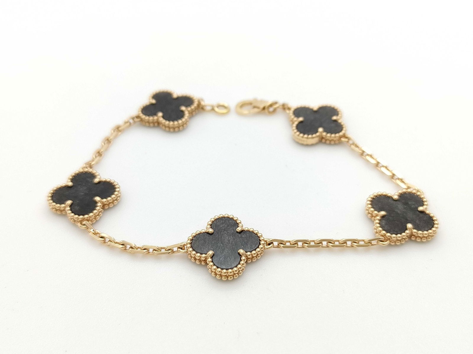 Van Cleef & Arpels Vintage Alhambra Silver Obsidian 5 Motif 18K Rose Gold Bracelet: Title/Medium: Van Cleef & Arpels Vintage Alhambra Bracelet, 18K Rose Gold and Silver Obsidian Origin/Year: France, 2015-2024 Dimensions: Fits most wrist sizes Condition: Estate pre-owned, very good co