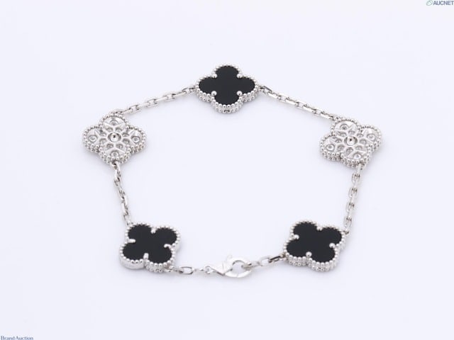 Van Cleef & Arpels Vintage Alhambra Black Onyx & Diamond Pave 5 Motif 18K White Gold Bracelet: Title/Medium: Van Cleef & Arpels Vintage Alhambra Bracelet in 18K White Gold with Black Onyx & Diamonds Origin/Year: France, 2015-2024 Dimensions: Standard bracelet length Condition: Estate pre-owned.