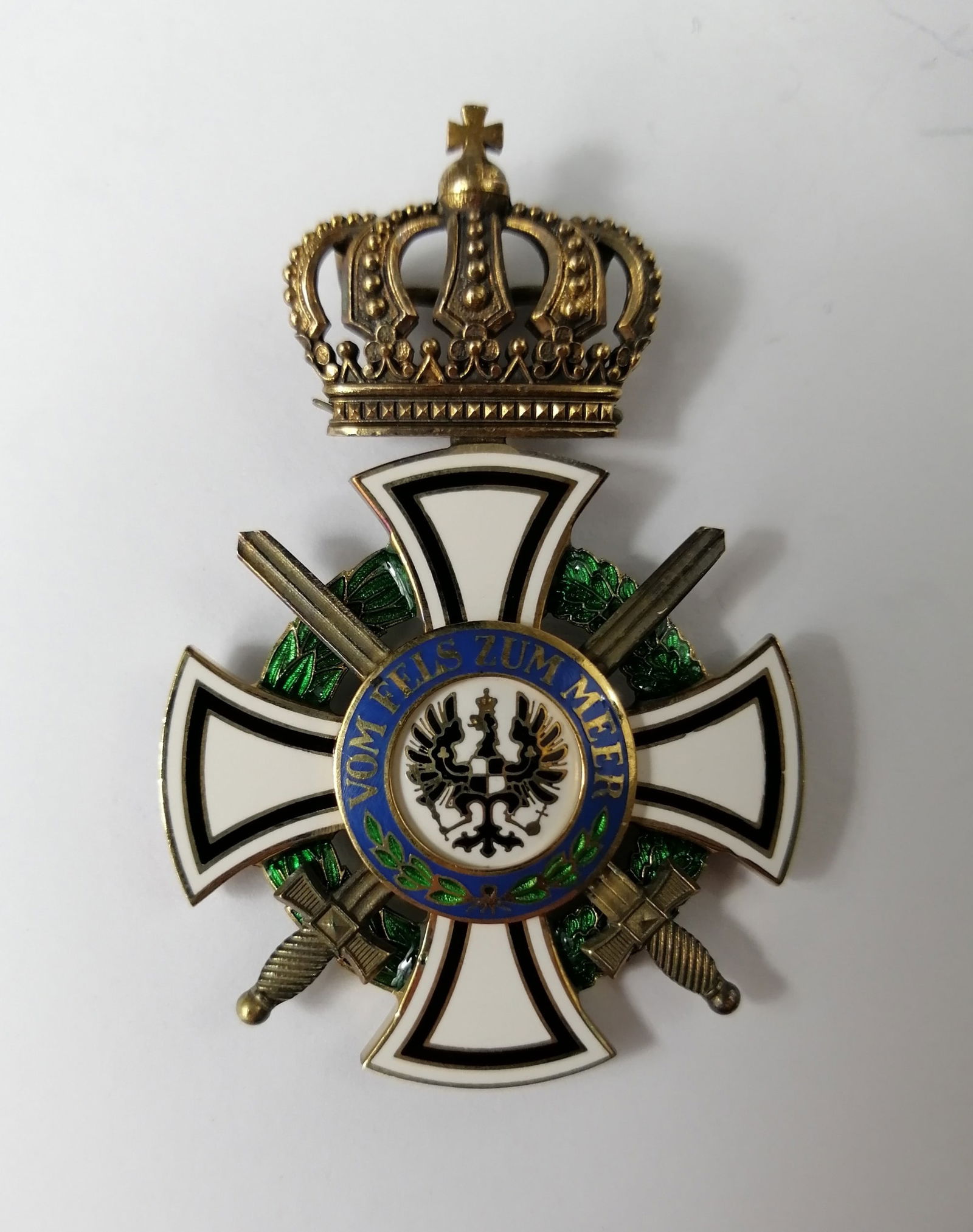 Hohenzollern Knights Cross Medal: Title/Medium: Hohenzollern Knight's Cross with Swords, Silver-gilt and Polychrome Enamel Origin/Year: Germany, Early 20th Century Dimensions: 38.6 x 58.8 mm Condition: Excellent condition; clean