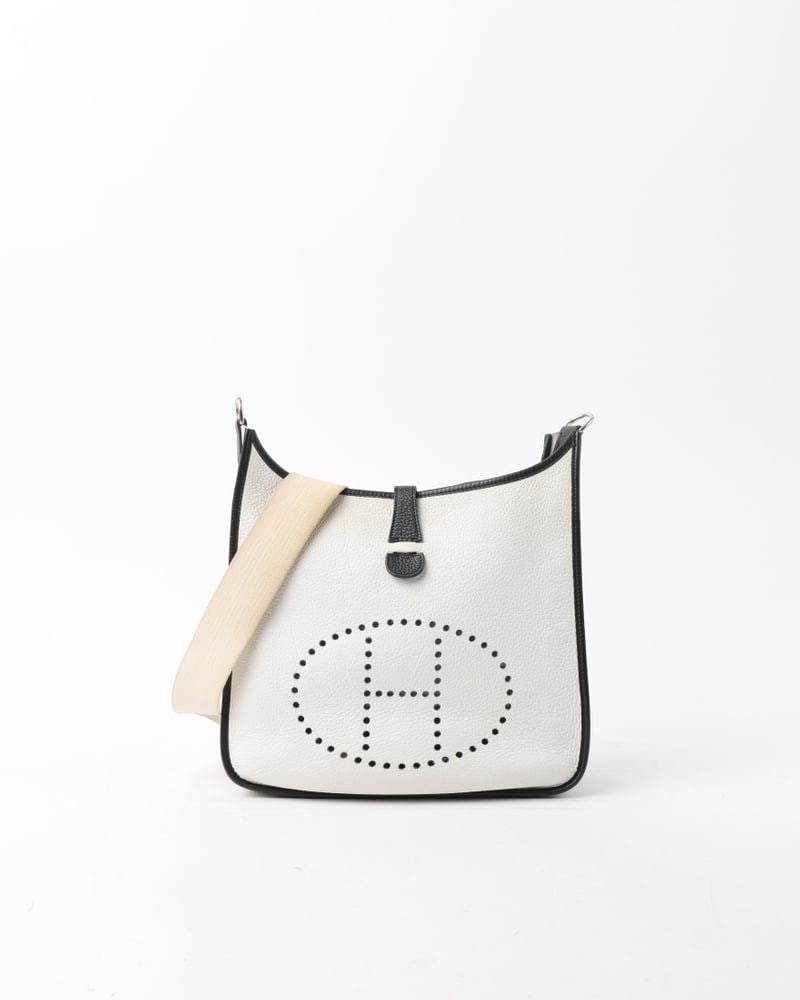 Hermes Clemence Evelyne GM Bag - White Leather: Title/Medium: Hermes Clemence Evelyne GM Bag - White Leather Origin/Year: Made in France, 1999 Dimensions: Height: 28 cm Width: 30 cm Depth: 8 cm Shoulder strap drop: 45 cm Conditi