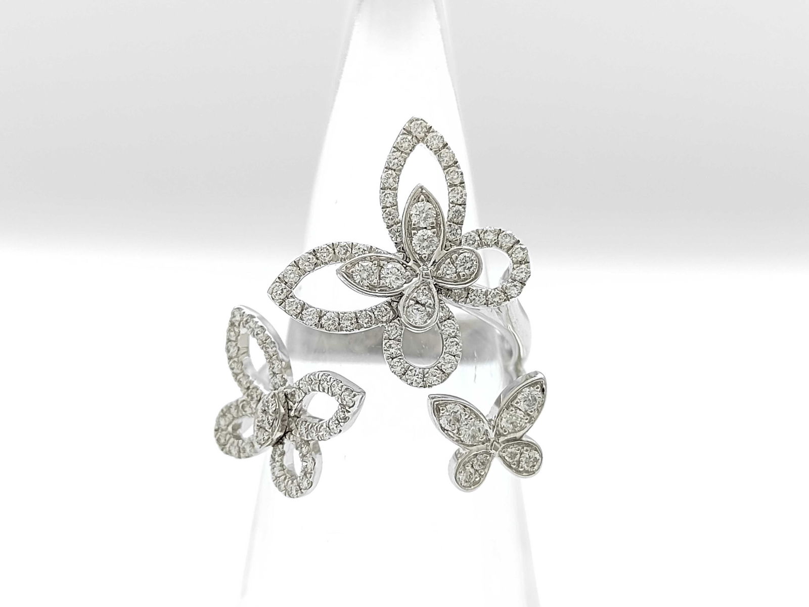 Graff Butterfly Silhouette Diamond 18K White Gold Ring: Elegant Graff Butterfly Silhouette ring crafted in 18K white gold and set with brilliant-cut diamonds. The design showcases Graff's iconic butterfly motif with delicately pave-set diamond wings arrang