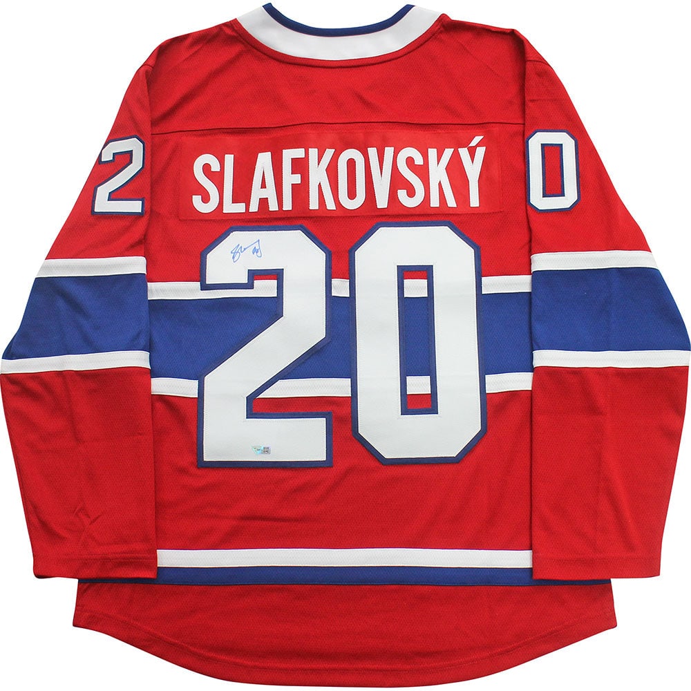 Juraj Slafkovsky Autographed Montreal Canadiens Replica Jersey: Title/Medium: Juraj Slafkovsky Autographed Montreal Canadiens Replica Jersey Get your very own replica jersey that has been autographed by Canadiens star Juraj Slafkovsky. Comes with Certificate of Au
