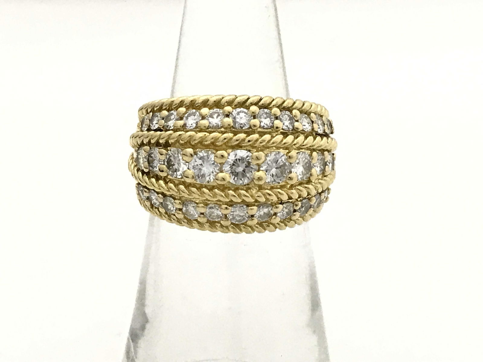 Vintage Multi-Row Diamond 18K Yellow Gold Rope Design Band Ring: Elegant multi-row band ring crafted in solid 18K yellow gold, featuring several rows of brilliant-cut diamonds framed by textured rope-style gold detailing. The layered design creates a bold yet refin