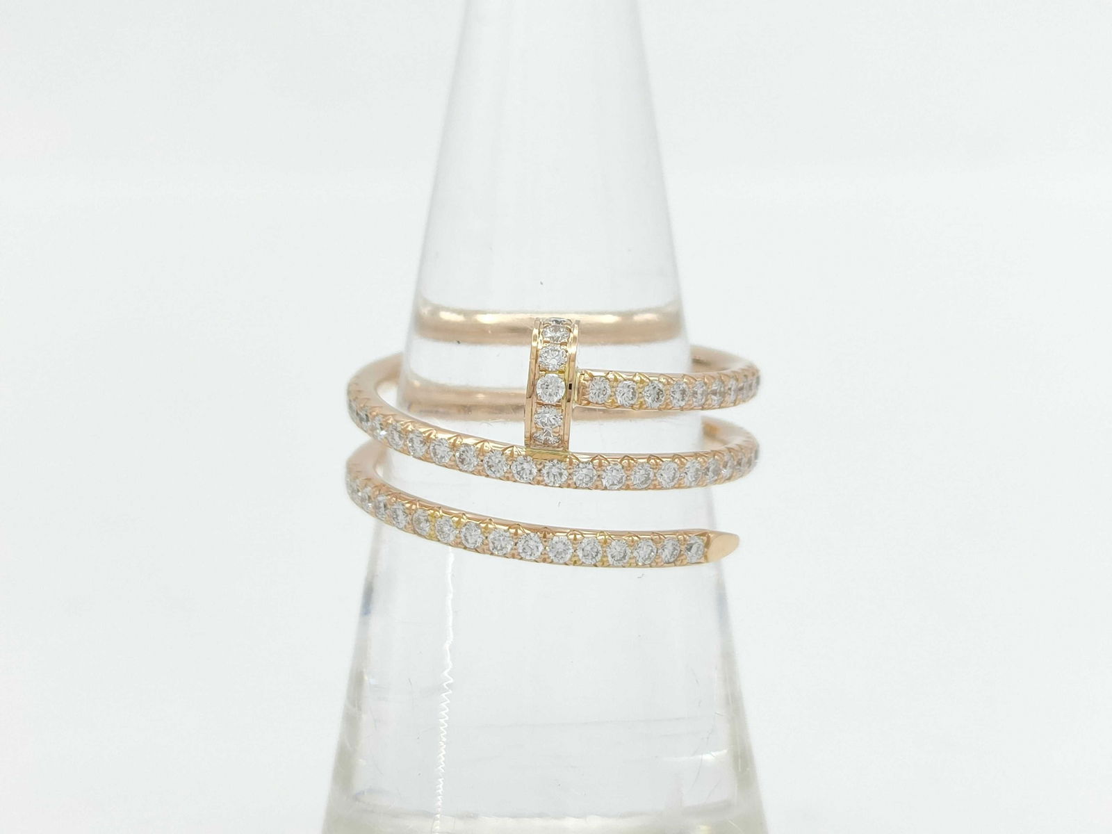 Cartier Juste Un Clou Nail Diamond 18K Rose Gold Ring: Description: This iconic Cartier Juste un Clou ring is crafted in solid 18K gold and features the signature nail motif, accented with brilliant diamonds that create refined brilliance and modern elega