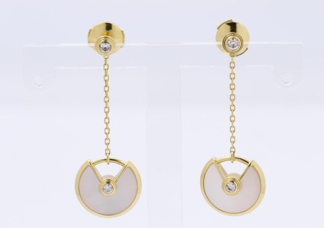 Cartier Amulette de Cartier Mother of Pearl Drop 18K Yellow Gold Drop Earrings: Origin/Year: France, 2010–2019 Condition: Very good pre-owned condition. Please review all photographs carefully as they form part of the description. Provenance: Authenticated through Cartier s
