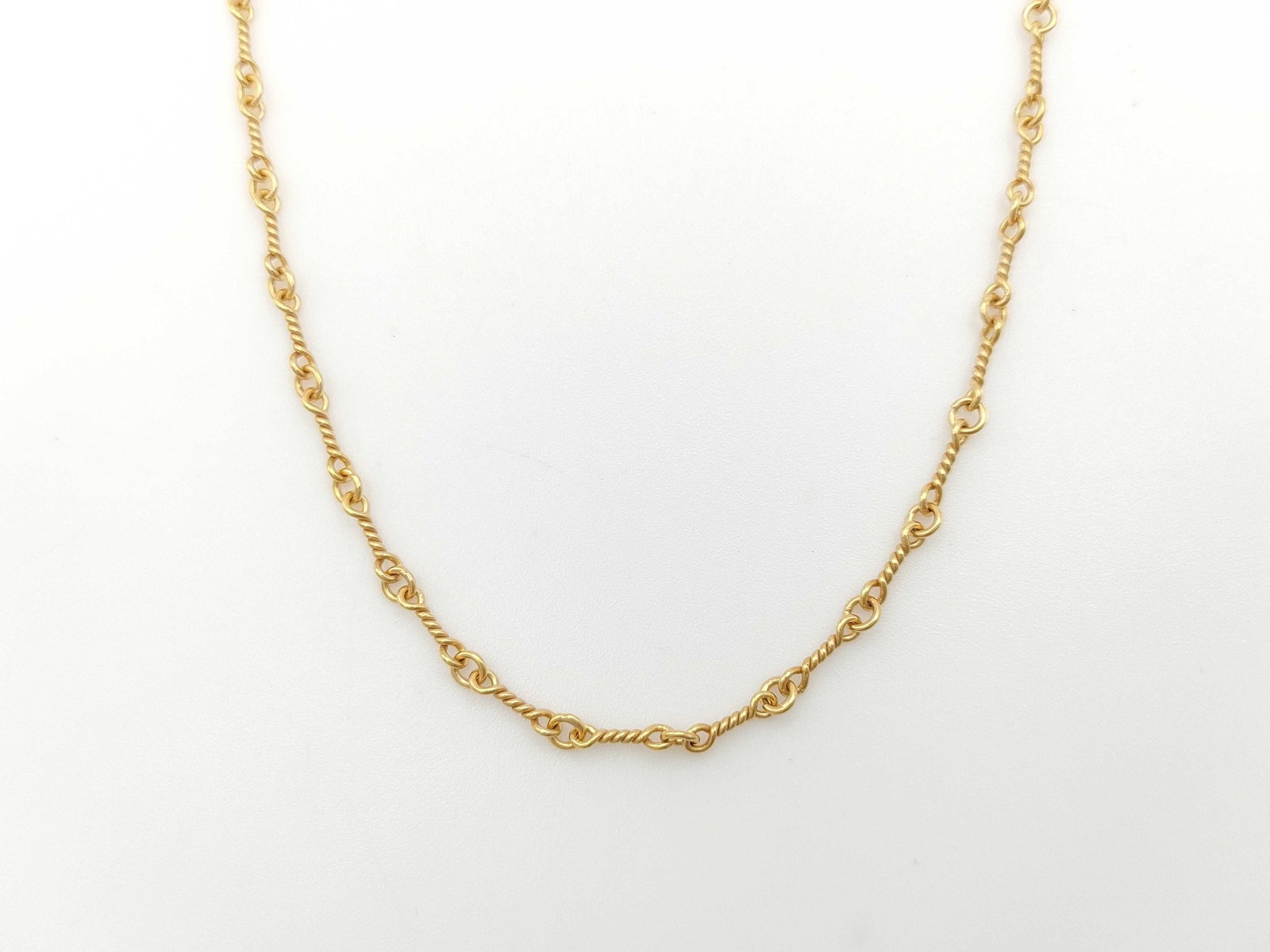 Chrome Hearts Twist Chain Gold 20 Inch Necklace: Description: Elegant Chrome Hearts twist chain necklace crafted in solid gold, featuring the brand’s distinctive twisted link design that creates fluid movement and refined texture throughout. T