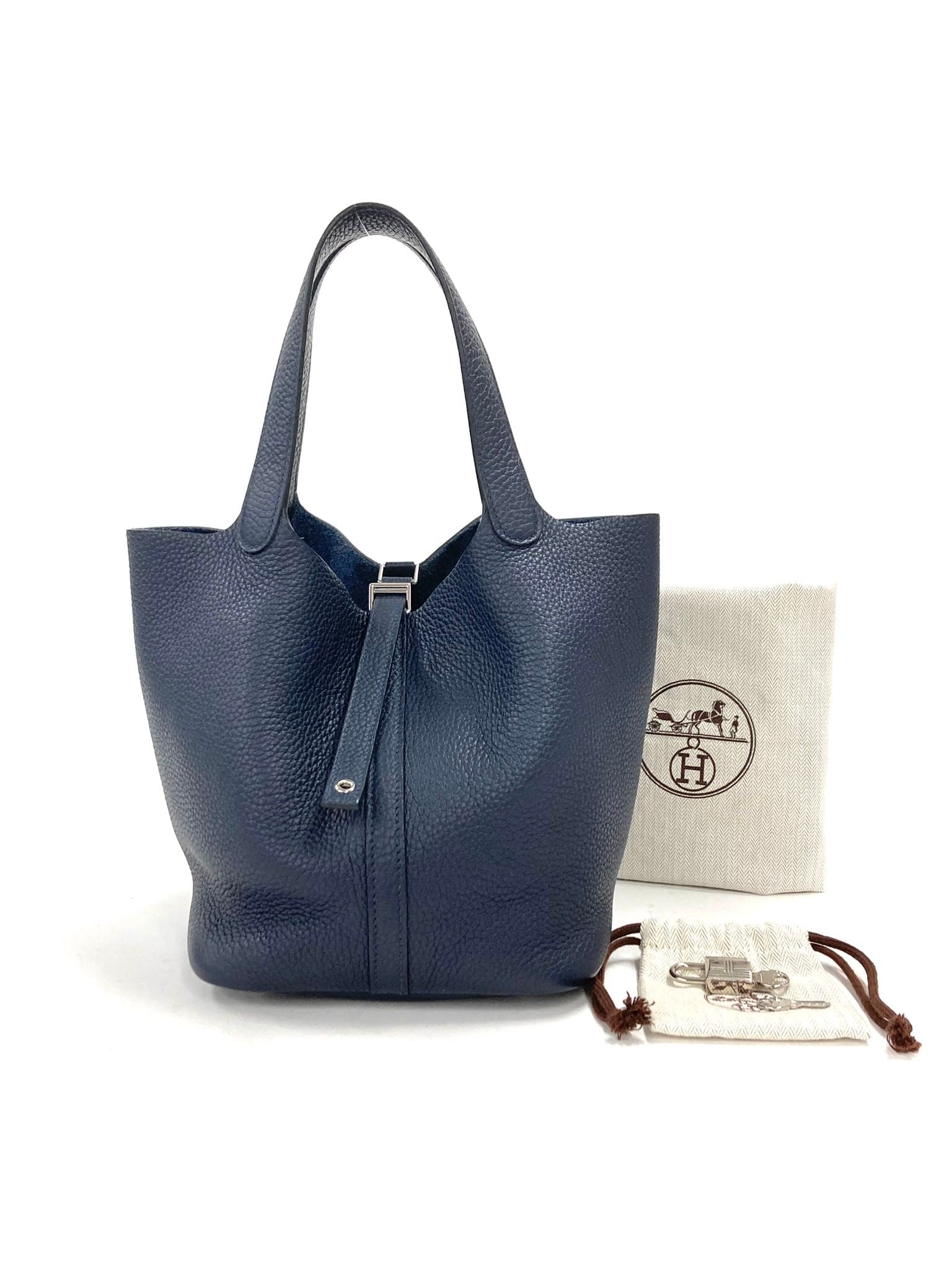 Hermes Navy Picotin MM Clemence Handbag: Title/Medium: Hermes Picotin MM Handbag Origin/Year: France, Y Stamp Dimensions: One Size Condition: SA Provenance: Includes lock, 2 keys, and dustbags Additional Info: Leather: Taurillo