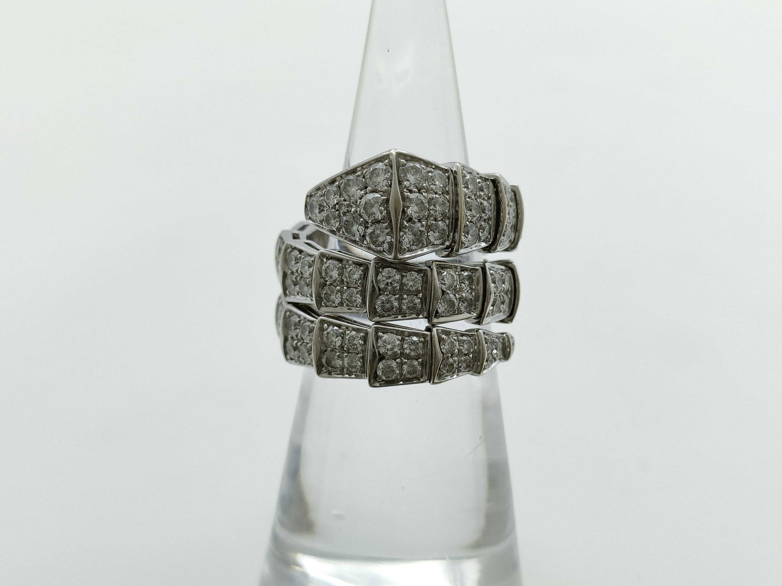 Bulgari Serpenti Viper Snake Diamond Pave Double 18K White Gold Ring: Description: This exceptional Bulgari Serpenti Viper ring is crafted in solid 18K gold and features the iconic double band snake motif, fully set with brilliant pavé-set diamonds that create rema