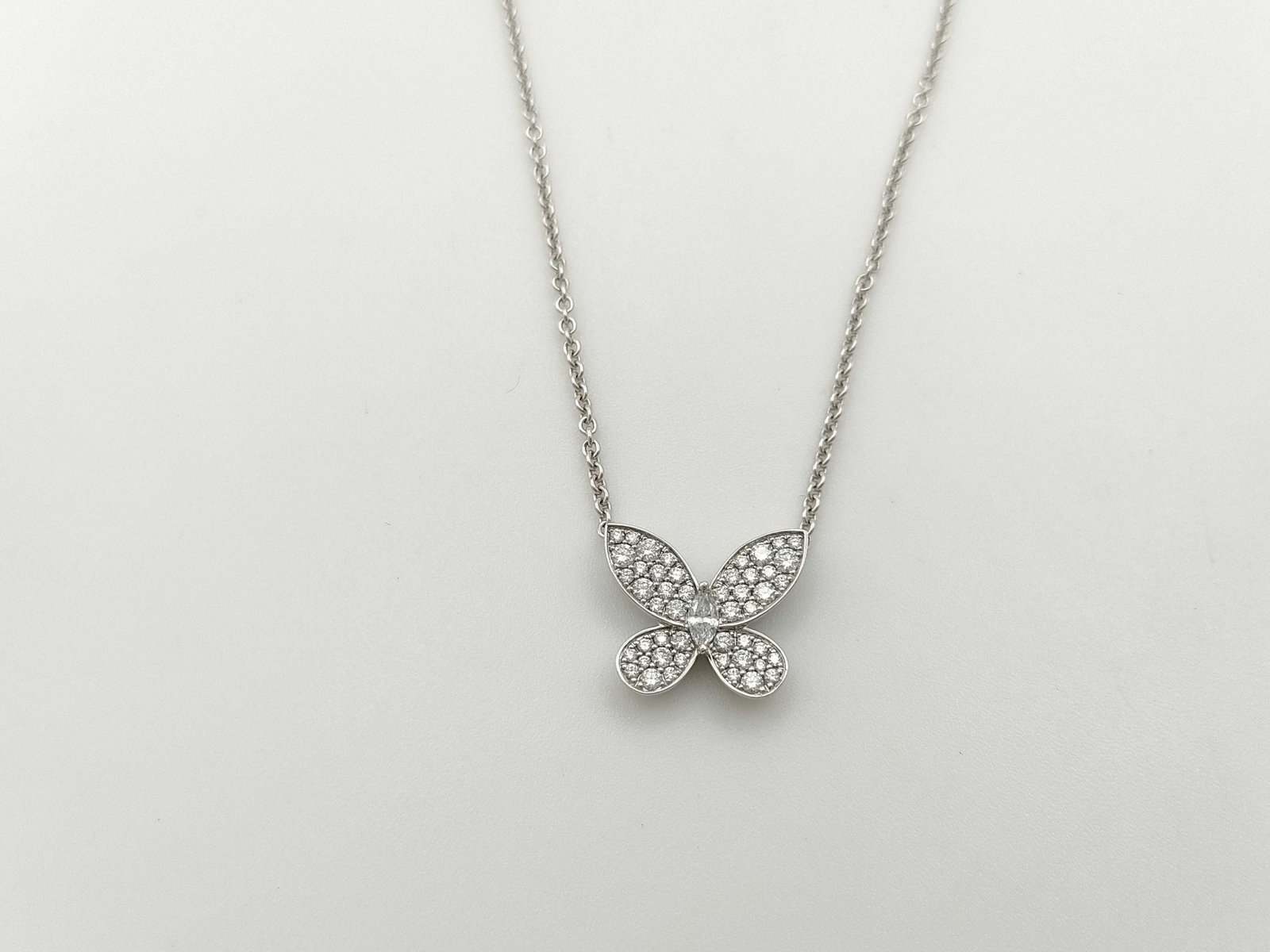 Graff Butterfly Mini Diamond 18K White Gold Necklace: Description: Elegant Graff Butterfly Mini necklace crafted in 18K white gold and set with brilliant cut diamonds. The delicate butterfly motif is fully set with pave diamonds, creating a refined and l