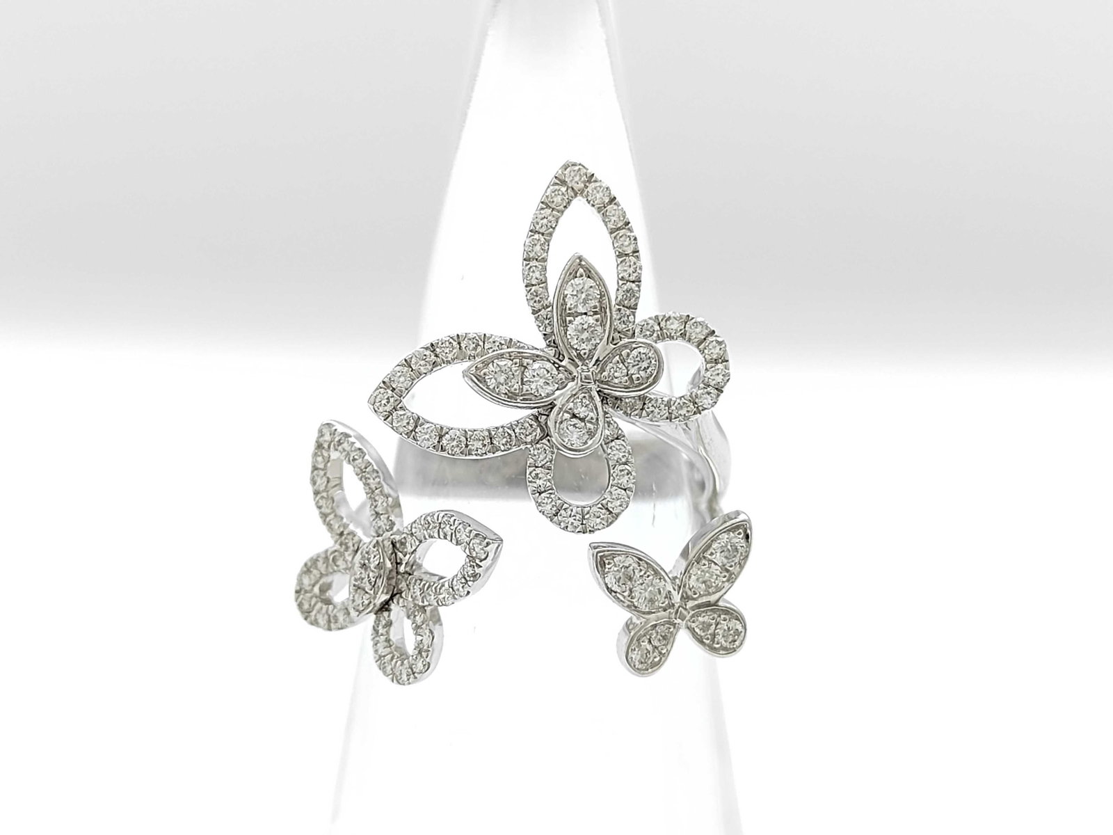 Graff Butterfly Silhouette Diamond 18K White Gold Ring: Description: Elegant Graff Butterfly Silhouette ring crafted in 18K white gold and set with brilliant-cut diamonds. The design showcases Graff’s iconic butterfly motif with delicately pavé-