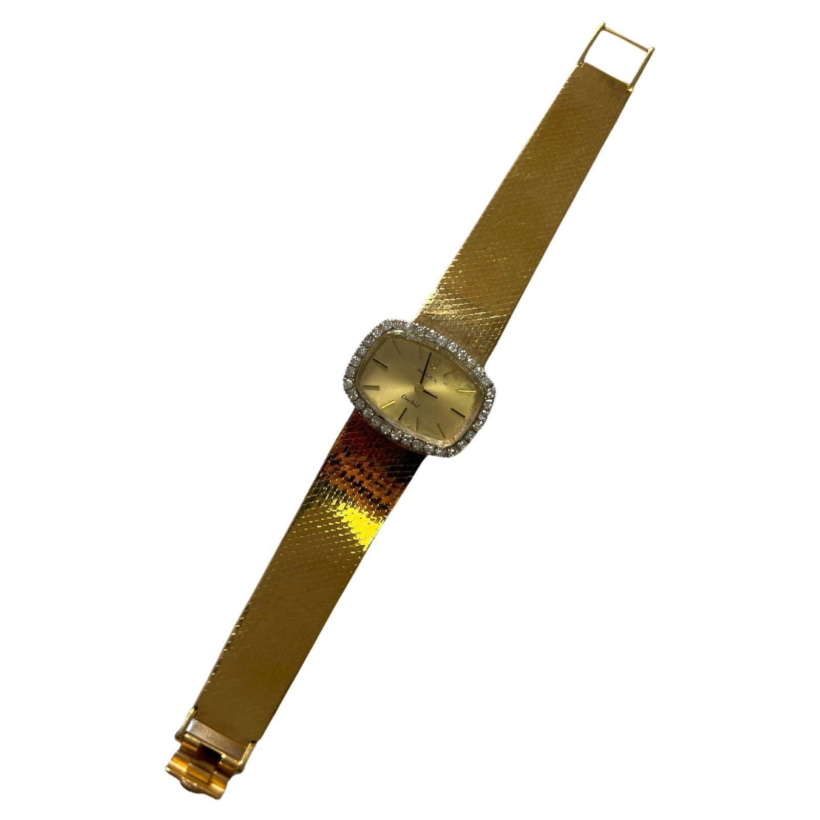 Vintage Rolex Orchid Cocktail Watch in Gold: Title/Medium: Vintage Rolex Orchid Cocktail Watch in Gold Origin/Year: Circa 1975 Dimensions: 6.1 inches length, Case Width: 25mm Condition: Great dial and bracelet; very good case with surface scratc