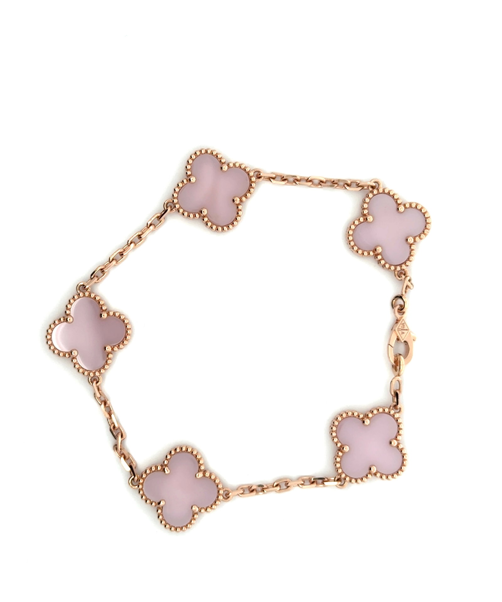 Van Cleef & Arpels Vintage Alhambra Pink Porcelain 5 Motif Bracelet 18K Rose Gold Rare Limited: Description: Elegant and highly collectible Van Cleef & Arpels Vintage Alhambra bracelet crafted in 18K rose gold (Au750) and adorned with five delicate pink porcelain motifs. Featuring the Maison