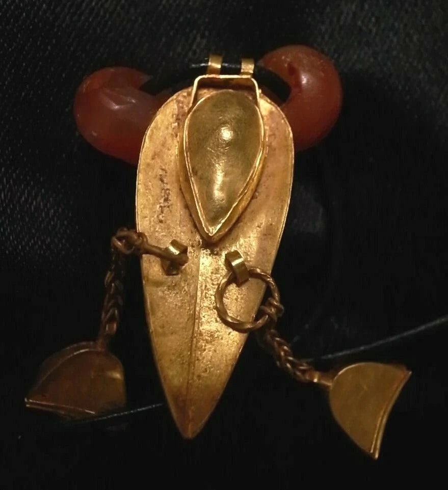 Ancient Gold & Agate Pendant - Greek/Sassanian: Title/Medium: Ancient Gold & Banded Agate Pendant Origin/Year: Greek, Phoenician or Sassanian, 1st Millennium BC/AD Dimensions: Small, exact dimensions not specified Condition: Well-preserved,