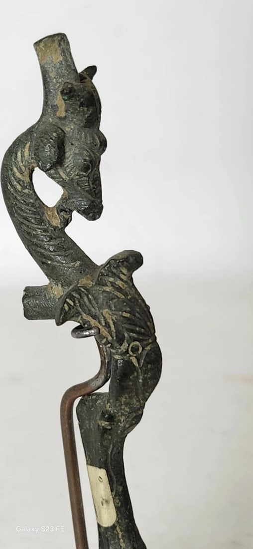 Antique Greek Bronze Ram Statue 12 CM: Title/Medium: Antique Greek Bronze Ram Statue Origin/Year: Greece, 1st Millennium BCE Dimensions: 12 CM height Condition: Good, with weathered patina Provenance: Private collection Additional Info: