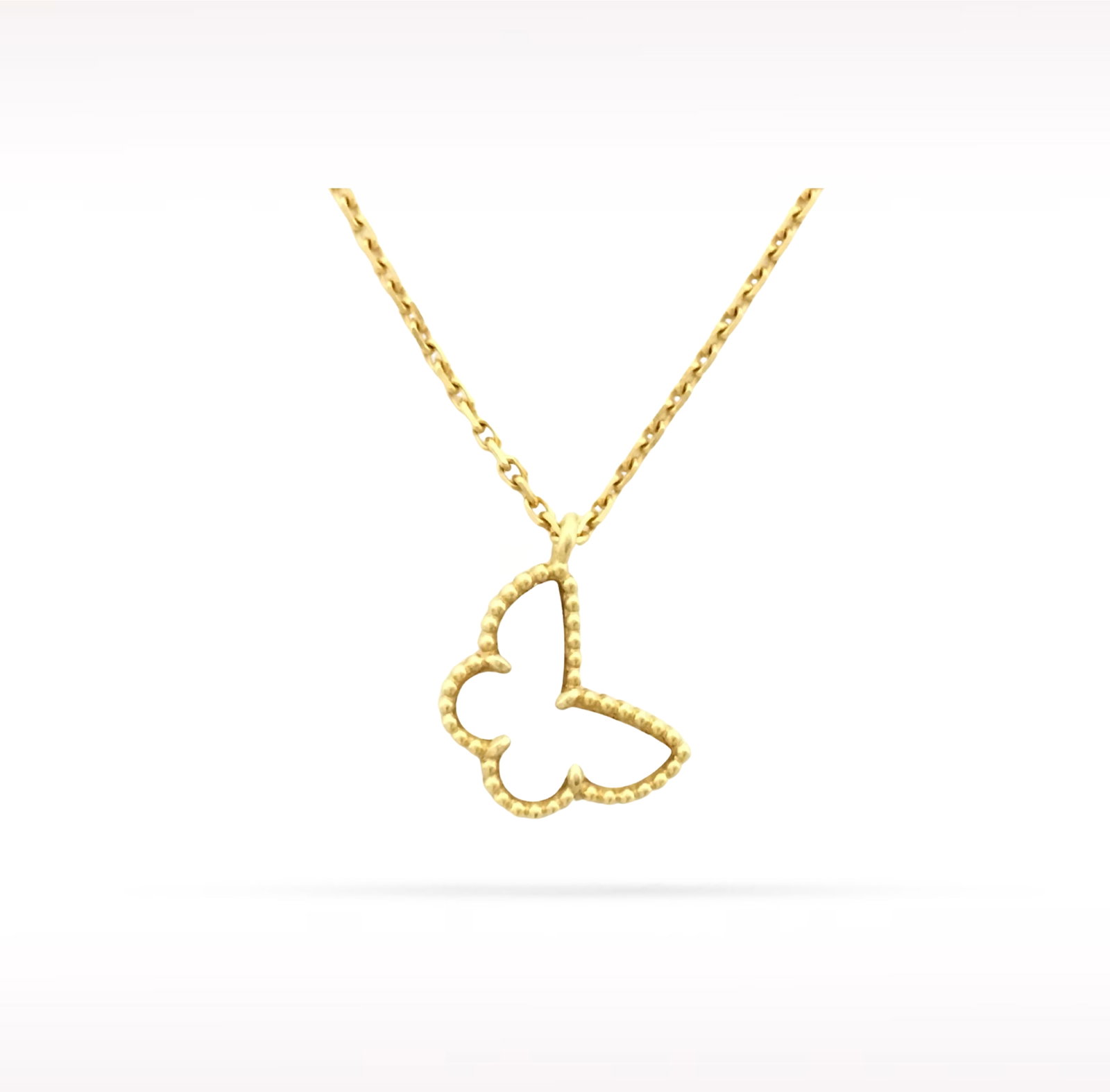 Van Cleef & Arpels Butterfly White Mother of Pearl 18K Yellow Gold Pendant Necklace: Description: Van Cleef & Arpels Butterfly pendant necklace crafted in 18K yellow gold and accented with natural white mother of pearl. Inspired by the beauty and grace of nature, this elegant pend