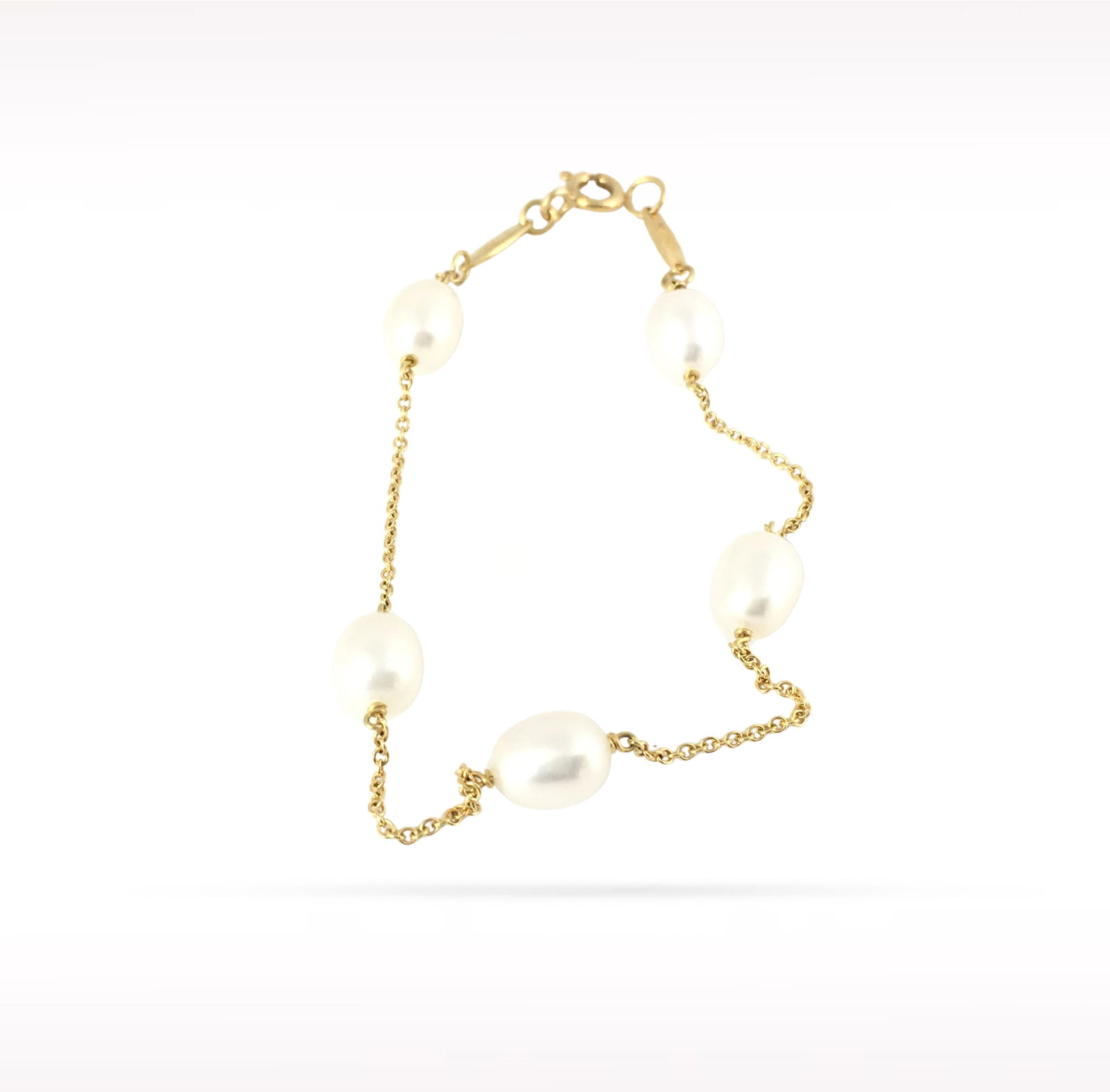 Tiffany & Co. Elsa Peretti Pearl by the Yard 18K Yellow Gold Bracelet: Description: Tiffany & Co. Elsa Peretti Pearl by the Yard bracelet crafted in 18K yellow gold and accented with lustrous natural pearls. Designed by Elsa Peretti, the Pearl by the Yard collection 