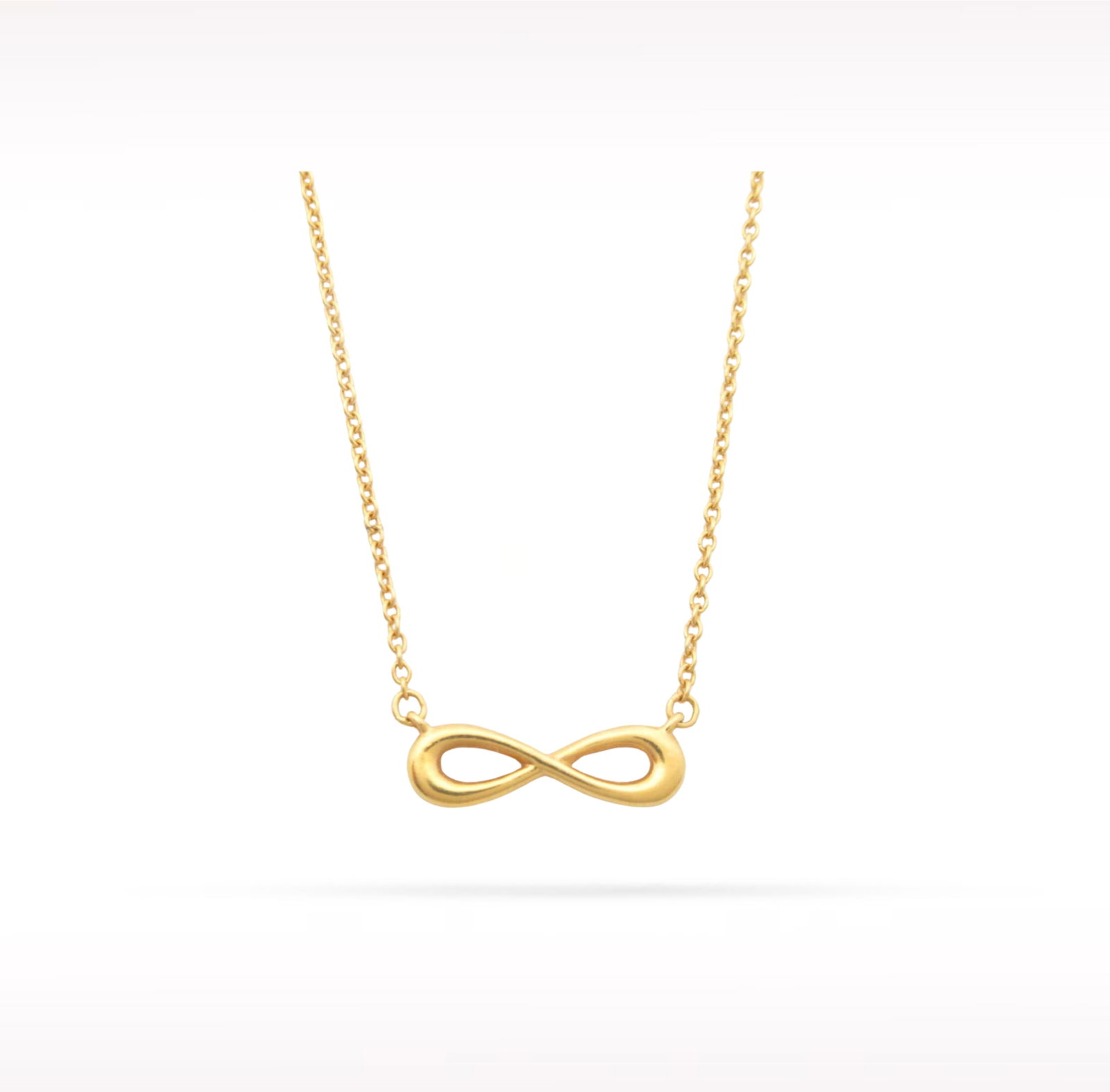 Tiffany & Co. Infinity 18K Yellow Gold Pendant Necklace: Description: Tiffany & Co. Infinity pendant necklace crafted in 18K yellow gold. Featuring the iconic Infinity motif, this elegant necklace symbolizes everlasting love, friendship, and endless pos