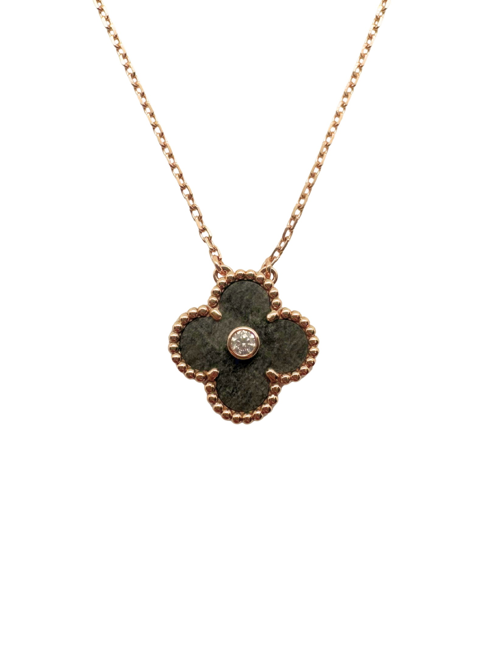 Van Cleef & Arpels 2023 Holiday Alhambra Silver Obsidian 18K Rose Gold Pendant Necklace: Description: Elegant and highly sought-after Van Cleef & Arpels Holiday Alhambra pendant necklace crafted in 18K rose gold (Au750), featuring the iconic Alhambra clover motif set with Silver Obsid