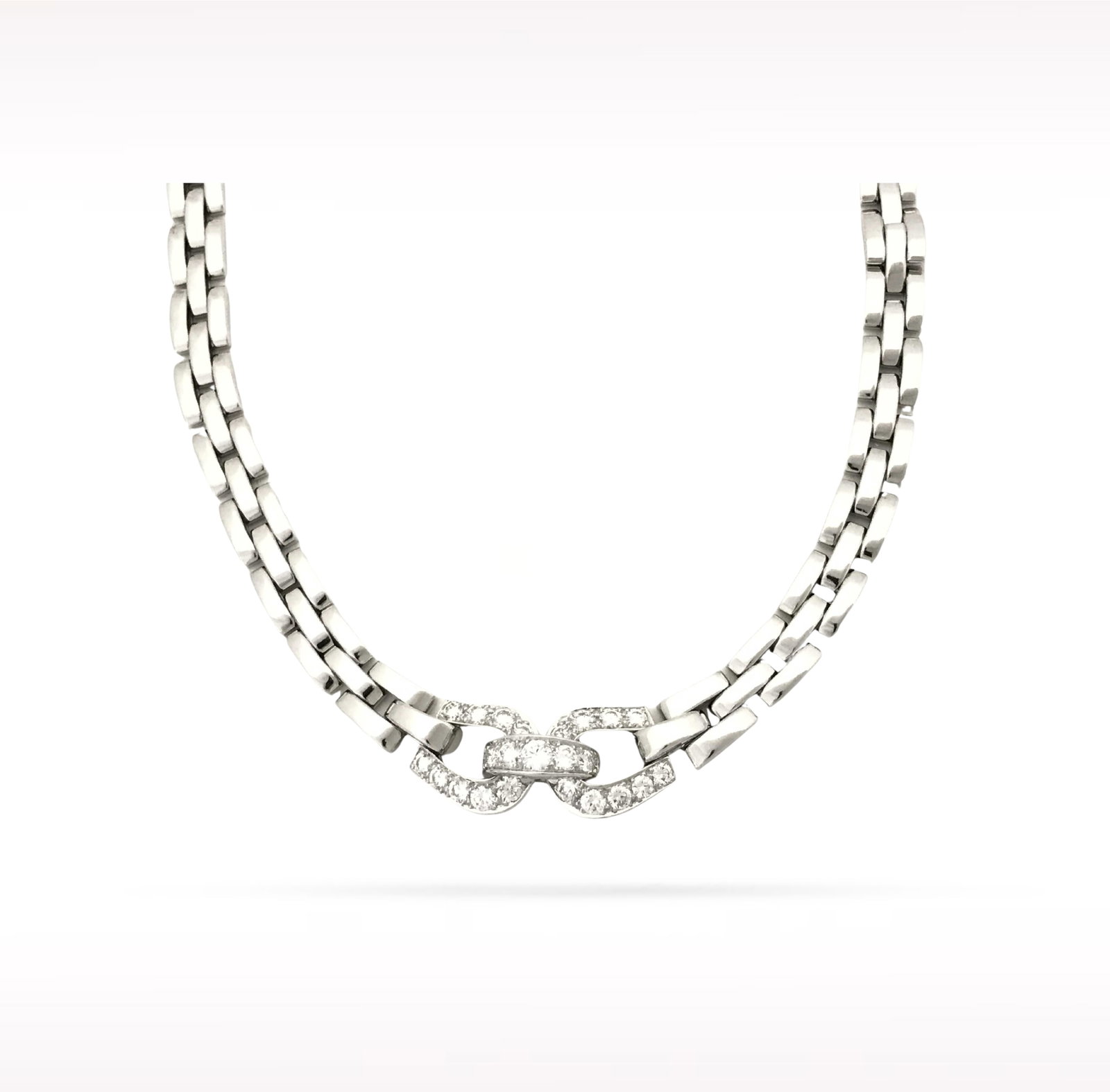 Cartier Maillon Panthere Diamond 18K White Gold Necklace: Description: Cartier Maillon Panthere necklace crafted in 18K white gold and accented with natural diamonds. From the iconic Maillon Panthere collection, this elegant necklace features Cartier's signa