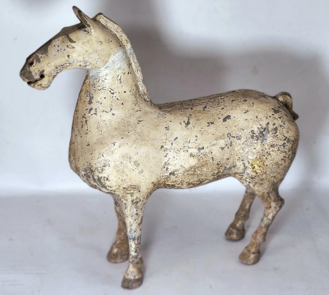 Antique Han Dynasty White Horse Sculpture: Title: Genuine Antique Han Dynasty White Horse Medium: Sculpture Origin/Year: China, 206 BC–220 AD Dimensions: 34cm L x 31cm H Condition: Aged with weathered finish Provenance: Unknown