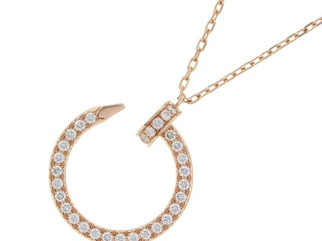 Cartier Juste un Clou Diamond Pave Nail 18K Rose Gold Necklace: Description: This exquisite Cartier Juste un Clou Diamond Pavé Necklace is crafted in solid 18K rose gold and showcases the Maison’s celebrated nail motif, elevated with brilliant pavé