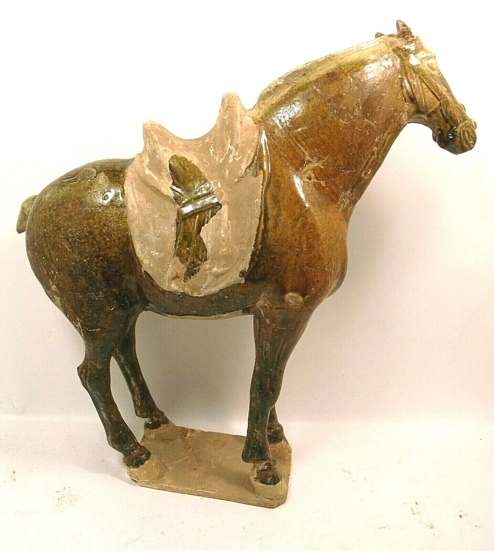 Antique Chinese T'ang Dynasty Glazed Horse: Title/Medium: Antique Chinese Glazed Horse Origin/Year: Tang Dynasty, 618-907 AD Dimensions: 14 inches high Condition: Excellent, with a shiny glaze finish Provenance: Private collection Addit