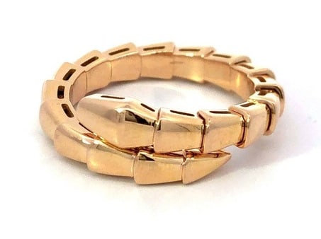 Bulgari Bvlgari Serpenti Viper 18k Rose Gold Ring: Description: Elegant and refined Bvlgari Serpenti Viper ring crafted in solid 18K rose gold. The design captures the sensual curves and bold spirit of the iconic serpent motif — a timeless symbo