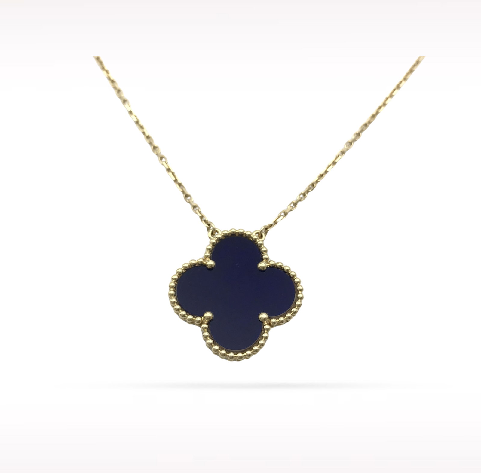 Van Cleef & Arpels Vendome Blue Ceramic Special Edition 18K Yellow Gold Pendant Necklace: Description: Van Cleef & Arpels Vendome pendant necklace crafted in 18K yellow gold and accented with vibrant blue ceramic. This Special Edition design showcases the elegant Vendome motif, combini