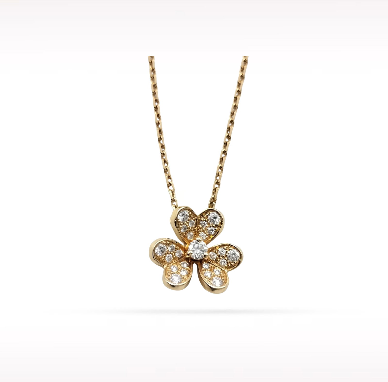 Van Cleef & Arpels Frivole Flower Pave Diamond 18K Rose Gold Pendant Necklace: Description: Van Cleef & Arpels Frivole Flower pendant necklace crafted in 18K rose gold and accented with natural pave set diamonds. From the iconic Frivole collection, this elegant pendant featu