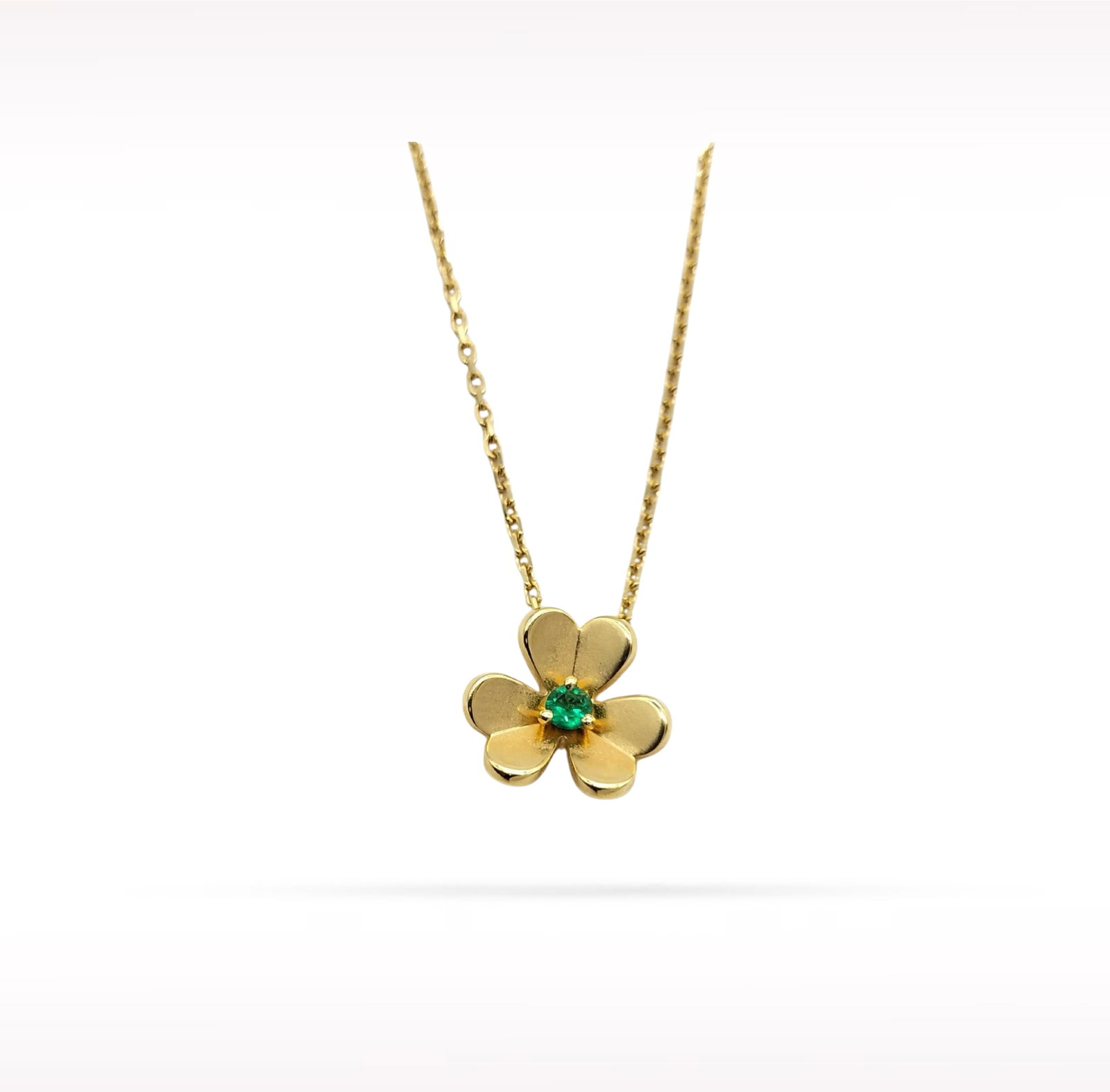 Van Cleef & Arpels Frivole Emerald 18K Yellow Gold Pendant Necklace: Description: Van Cleef & Arpels Frivole pendant necklace crafted in 18K yellow gold and accented with natural emeralds. From the iconic Frivole collection, this elegant pendant features the maison