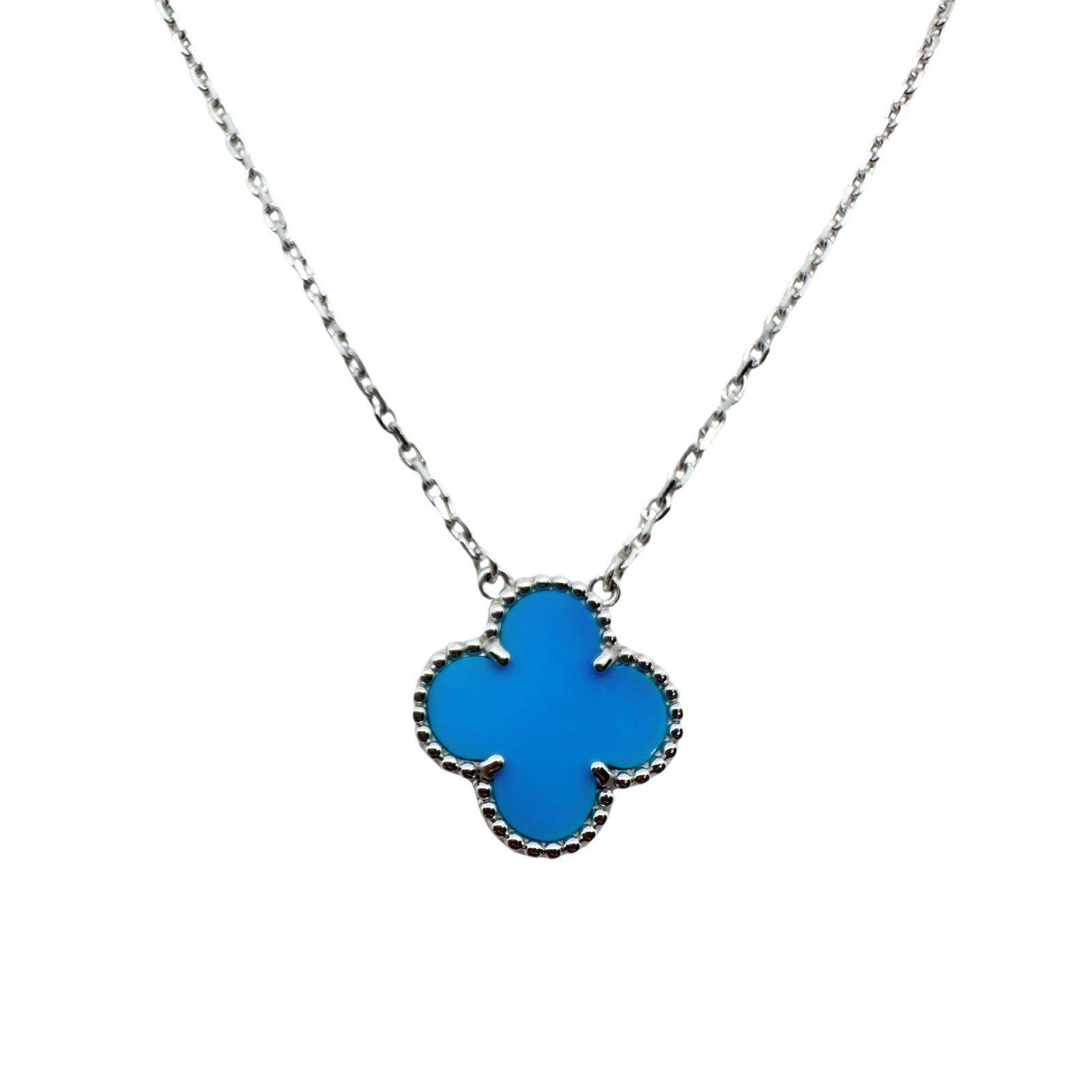 Van Cleef & Arpels Vintage Alhambra Turquoise Pendant Necklace 18K White Gold: Description: Elegant and highly collectible Van Cleef & Arpels Vintage Alhambra pendant necklace crafted in solid 18K white gold (Au750), featuring the Maison’s iconic Alhambra clover motif 