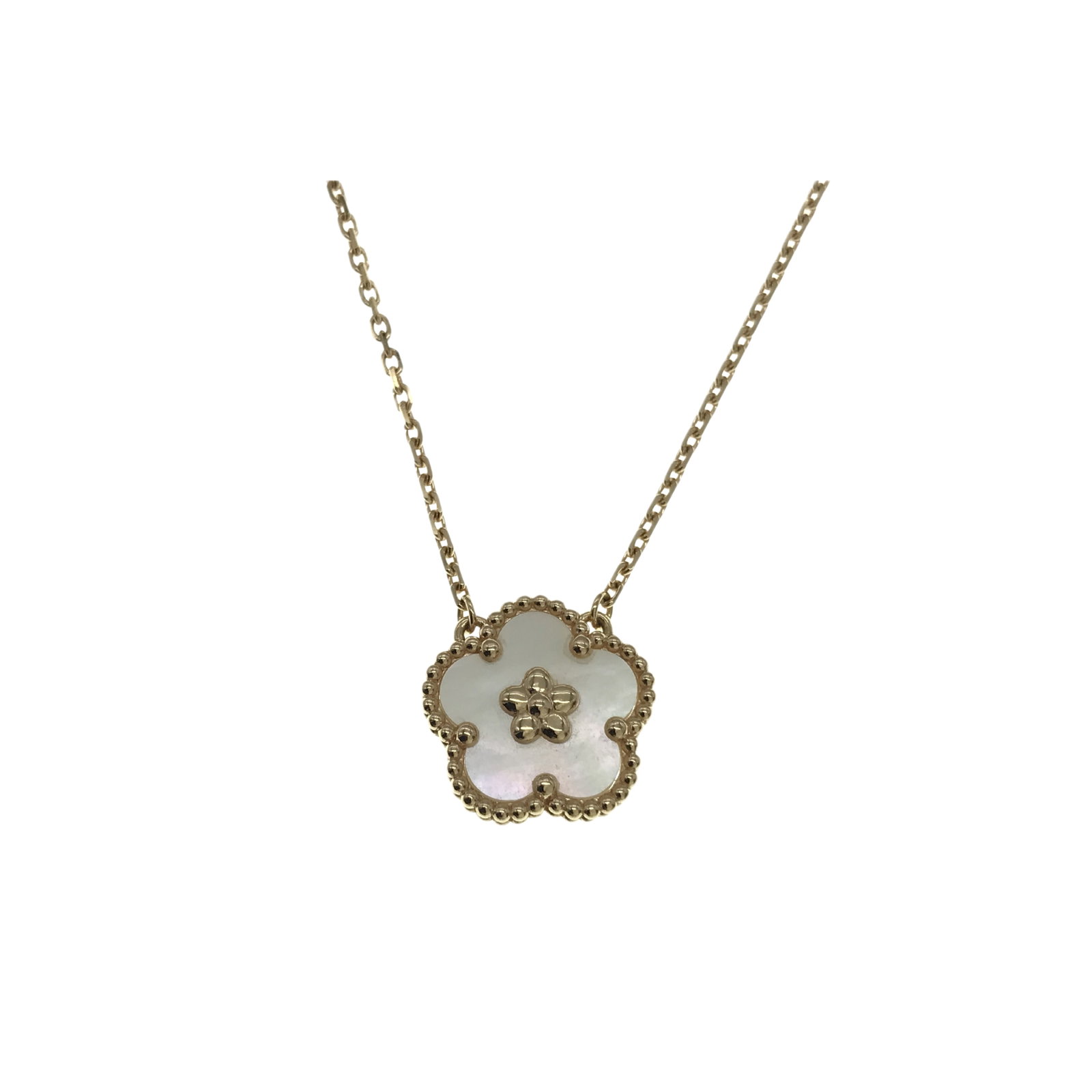 Van Cleef & Arpels Lucky Spring Plum Blossom White Mother of Pearl 18K Rose Gold Pendant Necklace: Description: Van Cleef & Arpels Lucky Spring Plum Blossom pendant necklace crafted in 18K rose gold and accented with natural white mother of pearl. From the enchanting Lucky Spring collection, th