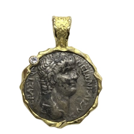 Ancient Roman Greek Style Coin Pendant with Diamond, 18K Gold and Sterling Silver Pendant: Title/Medium: Ancient Roman Greek style coin pendant in 18K yellow gold and sterling silver, set with a round brilliant-cut diamond. Origin/Year: Ancient-inspired numismatic design; date and specific 